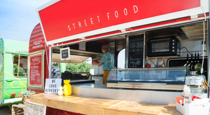 red food truck labelled "street food"