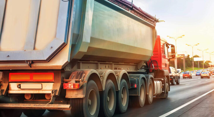 red dump truck on a highway