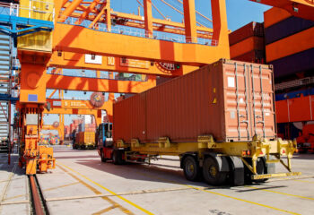 semi trailer truck at port to unload containers