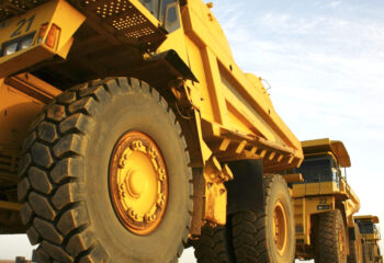 mining dump trucks on a construction site