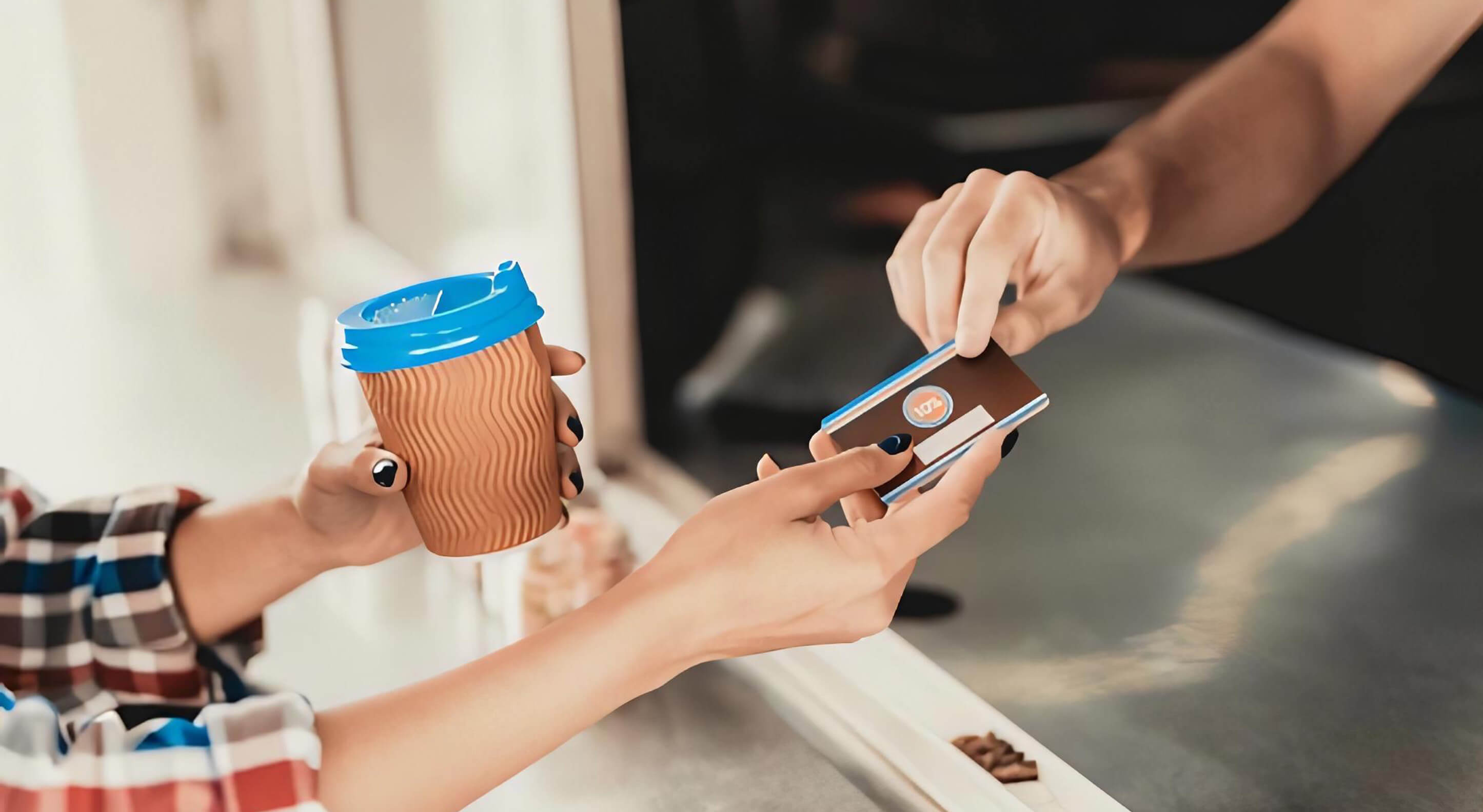 customer paying for coffee to a coffee truck owner