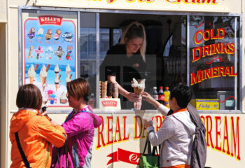 tourists buying ice cream from an ice cream van