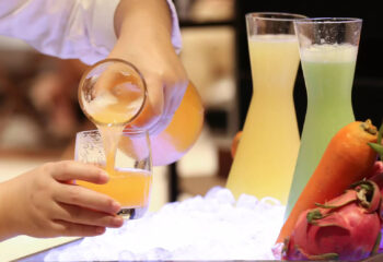 fruit juices being served from a food truck