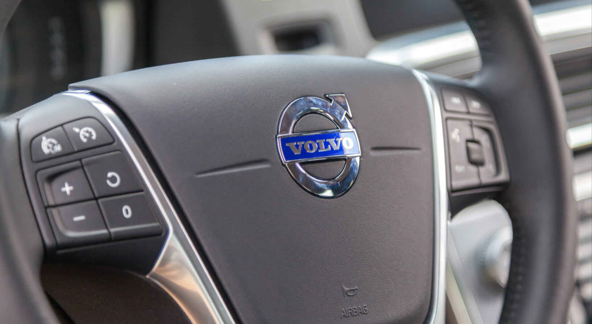 steering wheel on a volvo semi truck cockpit