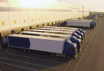 distribution warehouse with trucks awaiting loading