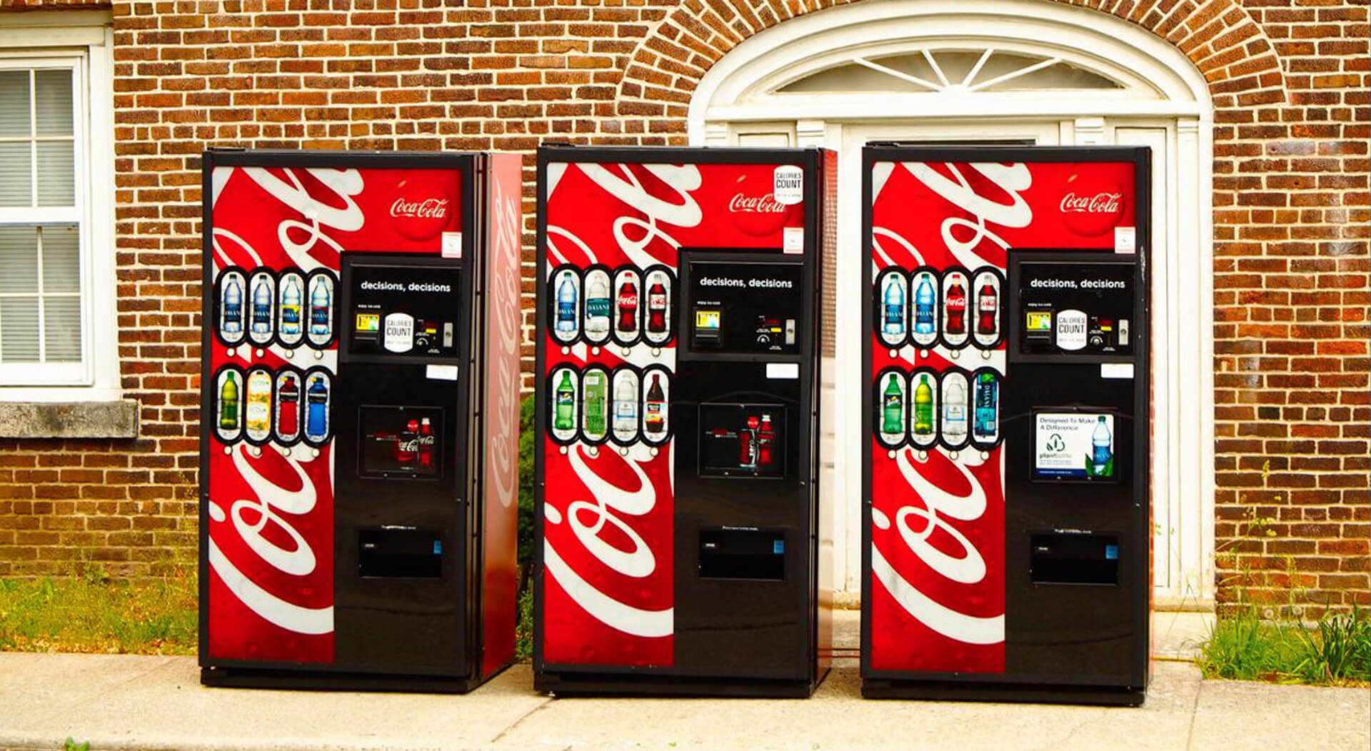 three coke vending