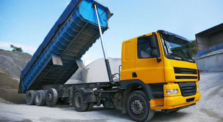 yellow dump truck in a quarry