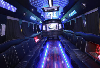 A big party bus filled with comfortable seats, and shiny bright floor for dancing and having fun.