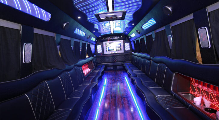 A big party bus filled with comfortable seats, and shiny bright floor for dancing and having fun.