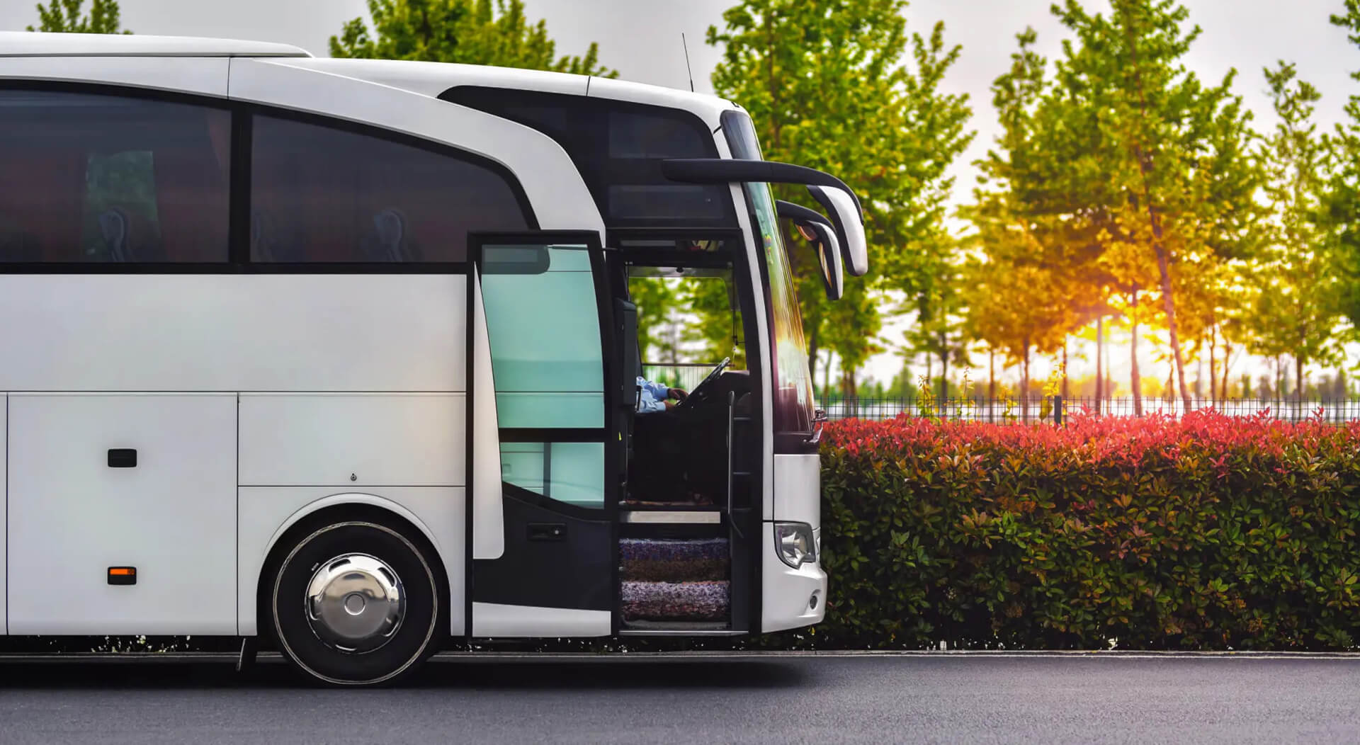 travel company bus greets tourists at the airport to take to the hotel