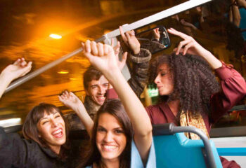 group of friends in a party bus