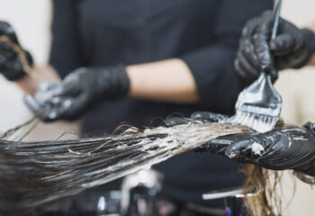 Woman changing hair color in a mobile hair salon