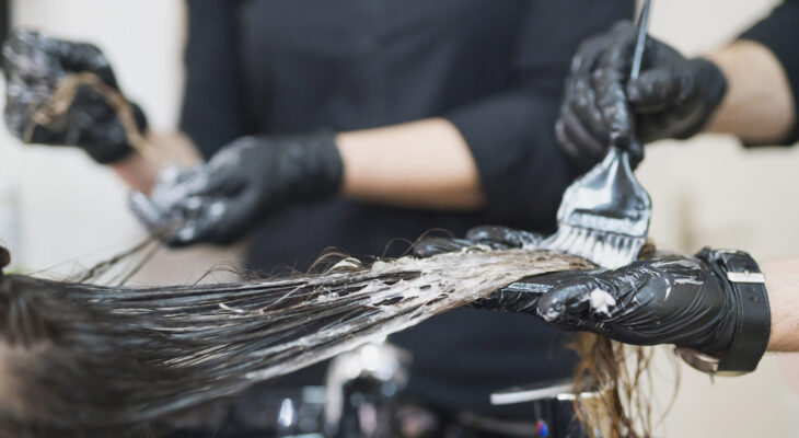 Woman changing hair color in a mobile hair salon