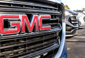 GMC logo on an SUV at a GMC dealership
