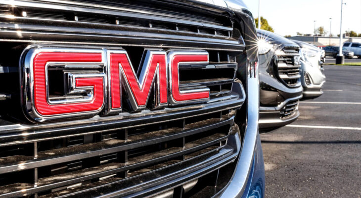 GMC logo on an SUV at a GMC dealership