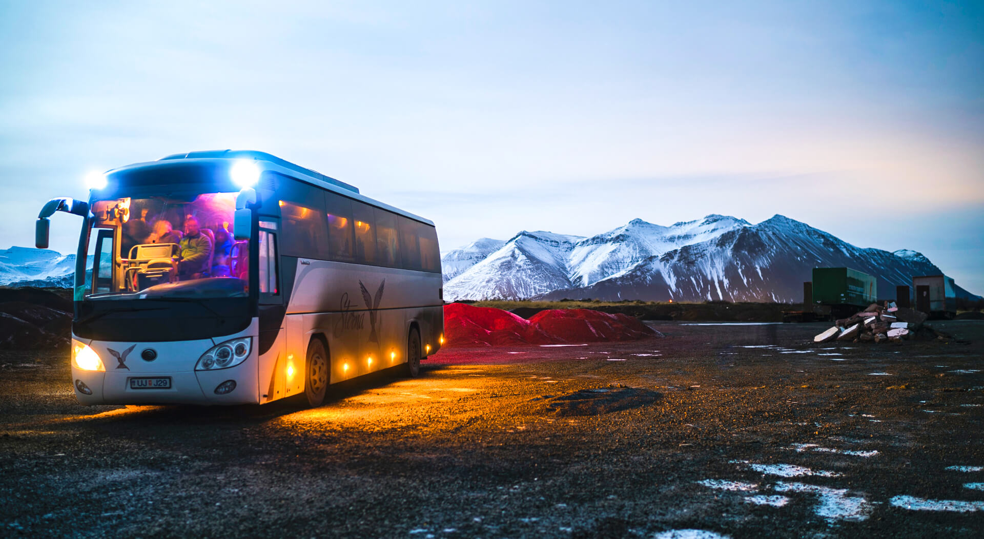 white coach bus rented as a tourist bus