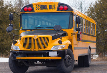 yellow school bus on road