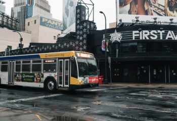 yellow and white bus on the road during daytime