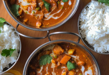 indian food set up at a table outside an indian food truck