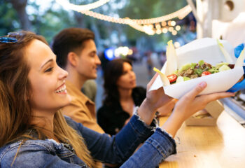 customer receiving order from a food truck