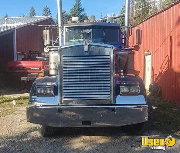 1997 Kenworth W900 Day Cab Semi Truck and 1981 Fruehauf Log Trailer for