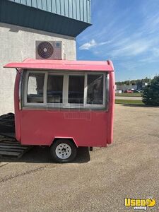 Compact Used 2022 - 6.5' x 9'  Fun Food Concession Trailer for Sale in Alberta!