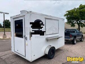 2022 - 7' x 12' Street Food Concession Trailer with Pro-Fire System for Sale in Colorado!